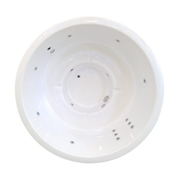 Image d'un bain nordique rond avec des jets intégrés et une finition blanche élégante.