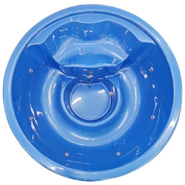 Jacuzzi extérieur rond avec un intérieur bleu élégant, idéal pour des bains relaxants en extérieur.